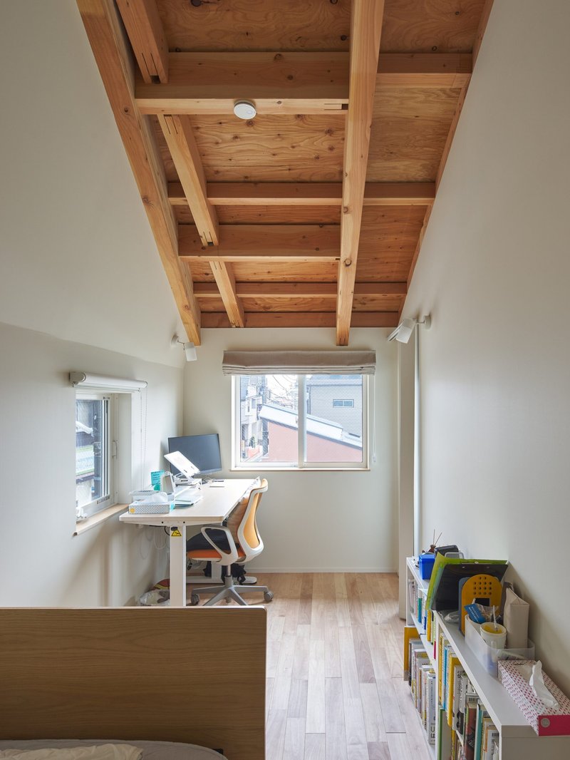 Two Large Roofs Leaning Together